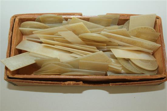A collection of Chinese circular and oblong mother of pearl gaming counters,